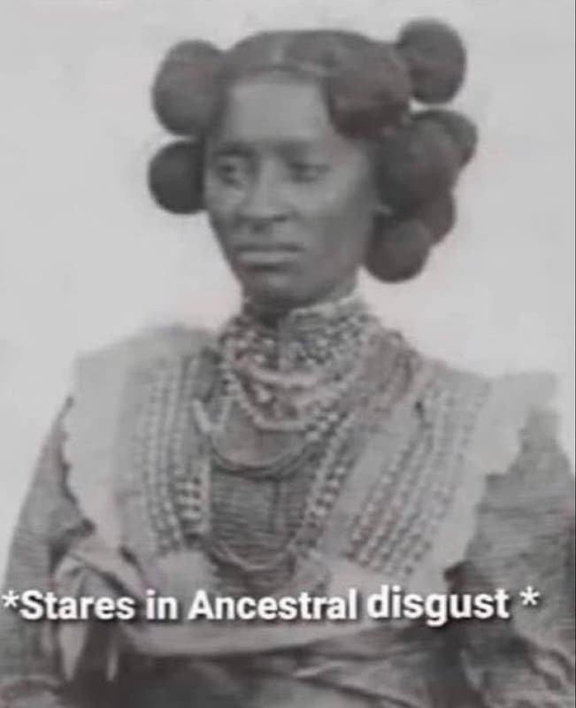 Stares in ancestral disgust